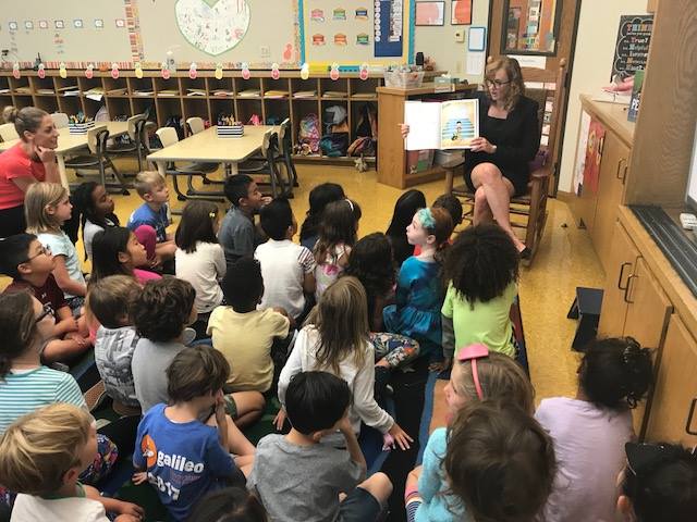 Laura reading to class