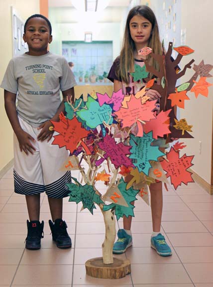 students and leaf craft