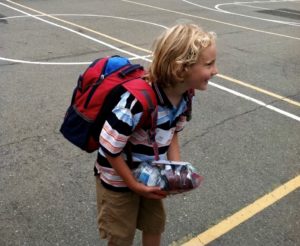 child with a backpack