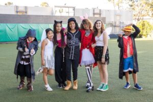 Group of middle school students standing together and smiling