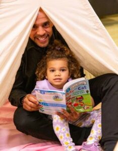 Parent reading to young child